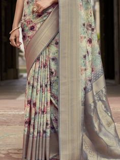 Memorialize your upcoming festivals, events, and any occasion with this beautifully printed design grey saree by giving the proper ethnic look to you. The "beautiful grey floral printed silk festival wear saree with blouse" is a stunning piece that will make you stand out in any crowd. Made from high-quality tissue silk, this saree features intricate digital print work and zari weaving border work that adds a touch of elegance to the overall look.
The saree comes with a matching grey color silk Gray Saree With Pallu For Festivals, Floral Print Digital Saree For Festivals, Gray Dupatta For Festivals, Festival Art Silk Floral Digital Prints, Festival Floral Art Silk Digital Prints, Festive Printed Saree, Floral Digital Prints For Festivals, Festive Floral Digital Prints For Diwali, Semi-stitched Floral Print Saree For Festivals