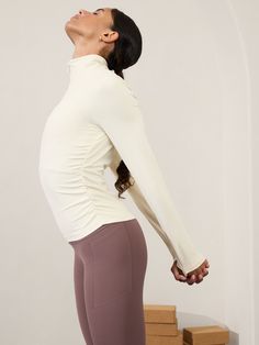 FOR: Yoga or studio practice FEEL: VITAFREE fabric with enhanced LYCRA® fiber is our lightest-feel yoga fabric for a barely there, yet fully covered sensation FAVE: Second-skin fabric stretches to your body for freedom of movement Fitted next to the body Regular length, hits at low hip Half zip Body length in size medium: Regular: 24". Breathable Micro-elastic Yoga Top, Micro-elastic Sportswear Tops For Yoga, Micro-elastic Moisture-wicking Tops For Pilates, Moisture-wicking Micro-elastic Tops For Pilates, Micro-elastic Athleisure Tops For Yoga, Fitted Beige Breathable Activewear, Beige Stretch Activewear For Functional Use, Beige Athleisure Activewear For Yoga, Beige Stretch Activewear For Workout