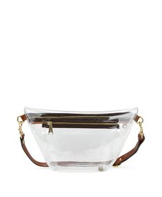 Our Tinchi Belt Bag is already a customer favorite, and due to popular demand, we are pleased to introduce it in our Clear Bag Collection. Perfect for work, sports events, and concerts, this stadium-approved clear bag allows you to carry your essentials while looking chic. 100% PVC, 100% full-grain leather trim Interior: clear PVC Exterior: clear PVC, leather trim with burned edge finish Zipper closure Signature brushed metal hardware, heavy handcrafted stitching Dimensions: 12 3/8"(W) x 7 1/4"(H) x 1 3/4"(D) Strap drop: 17" - 20" Strap circumference: approx. 21" - 38" Clear Rectangular Bag With Zipper Closure, Trendy Clear Plastic Travel Bag, Clear Shoulder Bag With Removable Pouch, Trendy Clear Bag With Clear Strap, Clear Travel Bag With Removable Pouch, Clear Shopping Bag With Removable Pouch, Trendy Clear Bags For On-the-go, Clear Crossbody Bag With Removable Pouch, Clear Shoulder Bag With Removable Pouch For Travel