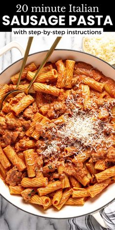 a pan filled with pasta and sauce on top of a table