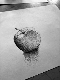 a pencil drawing of an apple sitting on top of a piece of paper