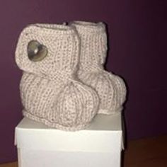 Hand Knitted baby boots available in various colours, examples are included in the photographs.  Cost quoted is for 0-6 months size but 6-12 months also available.  Please contact me for further information Baby Ugg Boots Knitting Pattern, Knitted Baby Boots, Ugg Style Boots, Baby Uggs, Ugg Style, Style Boots, Baby Boots, Knitted Baby, Kids Clothing