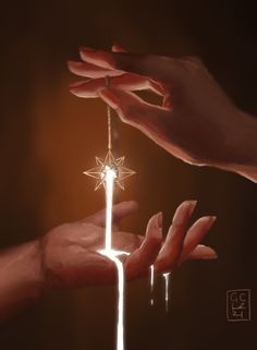 two hands reaching for a star ornament on a string with water dripping from it