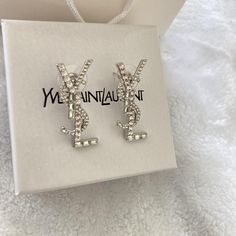 Silver YSL earrings #YSL #jewellery Ysl Jewellery, Ysl Earrings, Silver