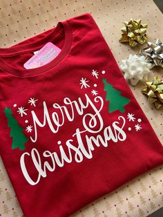 Christmas t-shirt , great for Christmas gift, family matching t-shirt, Christmas events  t-shirt : is unisex , stretch , very soft material  multiple colors available , please select one  also a variety of colors   PLEASE READ: white t-shirt will have red letters and green trees  the rest of the colors will come white as the sample with green trees   feel free to message me if you have  any questions  thank you for stopping by -----Marthalovescraft----- Christmas Tshirts Teepublic, Christmas Prints For Tshirt, Christmas Trees T Shirts Vinyl, Rudolf Shirt Vinyl, Christmas Tshirts 2022, Christmas Shirts Merry, Affordable Customizable Christmas T-shirt, Cheap Customizable Christmas T-shirt, Chriatmas Tshirt