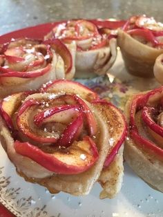 some food is on a red and white plate