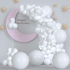 balloons and stars are floating in the air next to a crescent shaped birthday card that says happy birthday