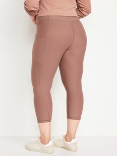 elasticized waistband hip pockets go-dry wicks moisture sits at belly button fitted hip and thigh hits mid-calf 21" regular inseam 19" petite inseam 24" tall inseam models are approx.  5'9" and wear sizes s (4), l (12), and xl (18)machine wash according to the care instruction label