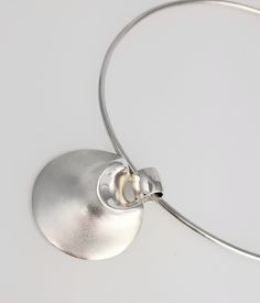 Featured in the British Vogue July 2019 issue! Our stunning Victoria pendant was designed by the awarded jewelry designer Matti Hyvärinen in the early 1970's. The modernist pendant has soft organic forms. It comes with the original stiff silver neck ring. It is available with either a highly polished surface with a satin dent or vice versa. Please let  us know your preferred finish when making the order. We have only one piece with the original neck ring left in our stock. We have a matching sil Neck Ring, Metalwork Jewelry, Accesories Jewelry, Special Necklace, Organic Forms, Artisan Earrings, Classy Jewelry, Funky Jewelry, British Vogue