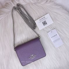 Color: Amethyst (Purple) Material: Crossgrain Leather Condition: Brand New With Tag Style Number: C0059 Dimensions: 4" (L) X 3" (H) X 1" (W) Detachable Chain Strap With 23 1/4" Drop For Shoulder Or Crossbody Wear Msrp $150 Two Credit Card Slots Snap Closure, Fabric Lining Outside Open Pocket 100% Authentic Price Is Firm Comes From Clean & Pet Free Environment Sold Out Everywhere Rare Find Coach Wallet On Chain With Details, Luxury Purple Rectangular Wallet, Coach Purple Evening Bag, Elegant Purple Wallet For Gift, Coach Wallet On Chain, Coach Mini Wallet, White Wallet, Amethyst Purple, Mini Wallet