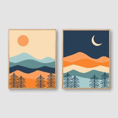 two posters with mountains, trees and the moon in them are hanging on a wall