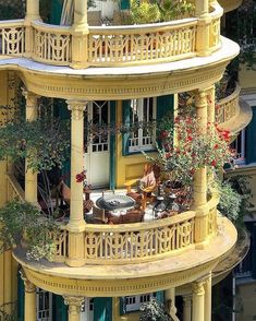 an apartment building with balconies on the balcony