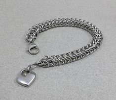 #Metal #Bracelet #Inca #wristband #Unisex #wristband #Steel #weavebracelet  #bracelets #chainmaille  #chainmailjewelry Weave Bracelet, Chainmail Bracelet, Chainmail Jewelry, Metal Bracelet, Woven Bracelets, Chain Mail, Strand Bracelet, Metal Bracelets, Chain Link Bracelet