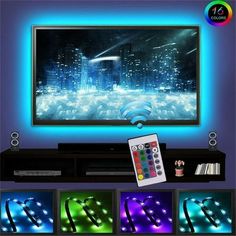 an entertainment center with various color lights and remote controls