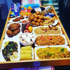 a wooden table topped with lots of food