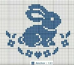 a cross stitch pattern with an image of a teddy bear in blue and white on it