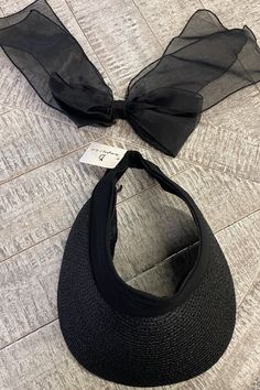 This stylish visor features a unique combination of straw and fabric, with a detachable organza bow secured by a pin. The design conveniently offers two looks in one, and an elastic back ensures a comfortable and secure fit. Organza Bow, Straw Visor, Trending Accessories, Looks Great, That Look, Straw, Elastic, Fabric, Fashion Tips