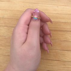 These pan pride flag floral rings can be the perfect way to subtly show off your identity, or a thoughtful gift to your loved ones in the LGBTQ community! These rings are made to fit ALL pansexual individuals and are also perfect for couples as an anniversary or just-because gift. Save up to 20% when you shop multiple listings in our store! -Wide Variety of Size Options  -Midi Ring Sizes -Choose Your Band Color -Durable -Comfortable Fit -Designed and Handmade by Seller -LGBT Owned and Operated Pansexual Pride Nails, Pansexual Outfits, Pan Pride Flag, Pansexual Jewelry, Pan Flag, Pansexual Shirt, Pan Pride, Pansexual Pride, Midi Ring