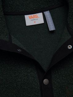 The Gotland Wool Overshirt from Varg is made from recycled wool from Italy. The shirt features cotton details, stylish snap buttons, a half-high collar, and a chest pocket. Both the fabric and the garment are manufactured in Europe. It’s a warm and comfortable everyday sweater that can be worn as an overshirt or as insulation. Recycled wool blend fabric from Italy.High Collar lined with main fabric.Snap buttons at front for closureOne chest pocket.Woven neck hanger loop.Varg woven label.Weight: Overshirt Men, Wool Overshirt, Sweater Vest Jacket, Everyday Sweater, Wool Clothing, Black Granite, Woven Label, Ski Trip, Fall Shopping