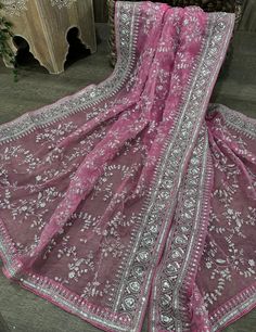 Gorgeous barely pink organza dupatta with silver embroidery and heavy sequins border. Elegant Silver Dupatta With Chikankari Embroidery, Silver Dupatta With Intricate Embroidery, Silver Traditional Wear With Chikankari Embroidery For Weddings, Silver Traditional Wear With Chikankari Embroidery, Traditional Silver Saree With Resham Embroidery, Pink Dupatta With Intricate Embroidery In Traditional Drape, Pink Dupatta With Intricate Embroidery, Silver Organza Dupatta With Resham Embroidery, Traditional Silver Fabric With Resham Embroidery