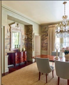 the dining room is clean and ready for us to use it's chandelier