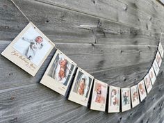 an old photo hanging on the side of a wooden wall with pictures attached to it