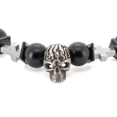 The Courage Onyx Skull Bracelet is not only a stylish accessory, but also a meaningful piece of jewelry that carries symbolic significance.  At the center of the bracelet sits a sterling silver skull bead, which serves as a powerful symbol of transformation and change. The intricately crafted skull bead is made from high-quality sterling silver, giving it a lustrous and luxurious look. The skull bead adds a touch of edginess to the bracelet, representing the courage to face mortality and embrace Black Gothic Jewelry With 8mm Beads, Black Symbolic Jewelry With 8mm Beads, Black Skull Stainless Steel Jewelry, Black Gothic Skull Bracelet, Black Stainless Steel Skull Jewelry, Black Symbolic Bracelet Jewelry, Symbolic Black Bracelet Jewelry, Black Edgy Bracelets As Gift, Symbolic Black Metal Bracelets