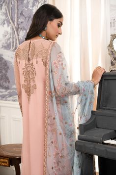 Designer Peach Shade Embroidered Pakistani Salwar Kameez Suit is an epitome of royalty and grace adorned with threads and embroidery. Hand-crafted details of tilla, sequins, pearls, and floral designs make this Pakistani Dress your foremost priority for the Parties. Asian Designers, Pakistani Salwar, Organza Sleeves, Pakistani Salwar Kameez, Salwar Kameez Designs, 3 Piece Suits, Fabric Stores Online, How To Dye Fabric, Embellished Dress