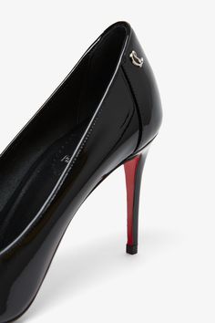 Black patent leather pumps from Christian Louboutin. The Sporty Kate pumps are made of black patent leather with a pointed toe, a plunging vamp that elegantly shows off the foot and is set on an 85mm slim stiletto heel.Signature red leather soleTrue to sizeMade in Italy