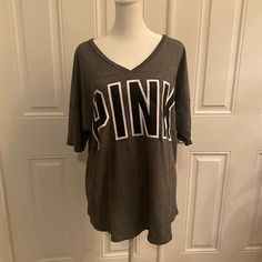 Women's Pink By Victoria's Secret Tshirt New With Tags All Grey Shirt Pink Logo On Front Dog Friendly Smoke Free Home All Vs Sales Receive Free Items!! $0-$30 1 Free Item (Sellers Choice) $31-$60 2 Free Items (Sellers Choice) $61-$100 3 Free Items (Sellers Choice) $101 And Above 4 Free Items (Sellers Choice) Casual V-neck Tops With Text Print, Oversized Logo Print Tops, Logo Print Short Sleeve Tops For Loungewear, Short Sleeve Logo Print Tops For Loungewear, Gray V-neck Tops With Letter Print, Gray Text Print Tops For Loungewear, Casual Tops With Letter Print For Loungewear, Pink Striped Shirt, Sequin Tee