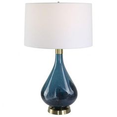 a blue table lamp with a white shade