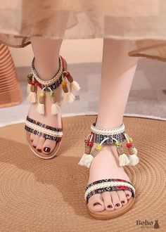 Introducing our latest collection of Boho Fringe Sandals, the ultimate blend of style and comfort for any free-spirited fashion enthusiast. Crafted with care, our fringe flat sandals offers a comfortable fit without sacrificing the bohemian chic aesthetic you love, with flowing fringes that dance with each step you take. Whether you're sauntering down the street or twirling at a beach party, these sandals bring the boho charm and a pinch of cheekiness to your step. Dive into the bohemian life and show off your unique style with these show-stopping sandals. Product Category: Bohemian Fringe Sandals Upper Material: Canvas Sole Material: Rubber Toe Shape: Round toe Lining Material: Microfiber leather Closure Type: Back zipper FREE FAST SHIPPING Satisfaction Guaranteed : If you ever want to re Bohemian Life, White Lace Maxi Dress, Boho Shoes, White Lace Maxi, Fringe Sandals, Chic Aesthetic, Boho Fringe, Fashion Enthusiast, Crochet Mini Dress