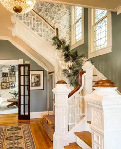 the stairs in this house are decorated for christmas