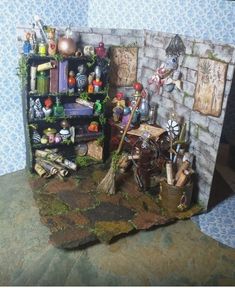 a miniature room with many items on the shelf