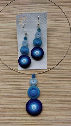 the earrings are made with blue and white beads