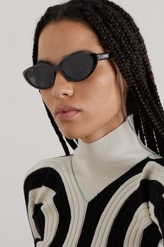 Retro sunglasses have become a regular in CELINE Eyewear's lineup and this cat-eye pair is an instant classic. Sculpted in glossy black acetate, the smoky gray lenses are built with UVA and UVB protection and the brand's logo and three-dot signature adorn the arms. Celine Cat Eye Sunglasses, Celine Eyewear, Sunglasses Cat Eye, Gray Lenses, Celine Sunglasses, Three Dots, Black Cat Eyes, Fashion Eyeglasses, Style Sunglasses