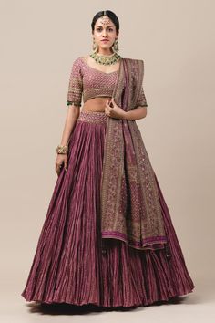 Purple crushed striped zari chanderi lehenga paired with blouse enhanced with zardozi, kasab and kundans. Comes with detachable brocade drape-dupatta embroidered in kasab and sequins.
Component: 3
Embroidered
Neckline: V Neck
Sleeve Length: Half
Fabric: Chanderi, Brocade
Color: Purple
Tassel tie-up back
Bead tassels - Aza Fashions Crushed Lehenga, Chanderi Lehenga, Indian Outfits Lehenga, Wedding Lehenga Designs, Lehnga Dress, Gaun Fashion, Choli Designs, Bridal Lehengas, Lehenga Blouse