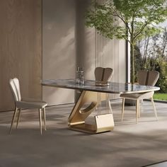 a dining room table with chairs and a vase on the floor in front of it