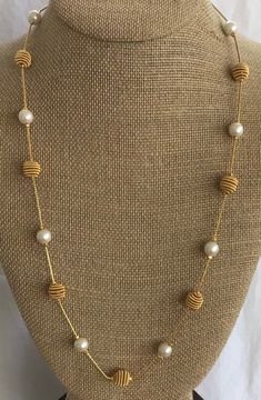 "Featuring this timeless white faux pearl and gold tone beaded chain necklace. It measures 24\" in length and is in excellent vintage condition. The necklace has a lobster claw clasp." Small Pearls Chain, Gold New Design Jewellery, Wire Wrapped Pearl Necklace In Gold, Gold Pearl Long Necklace For Formal Occasions, Elegant Gold Beaded Necklaces Wire Wrapped, Gold Beaded Long Pearl Necklace, Gold Long Beaded Necklace With Pearl Chain, Elegant Gold Beaded Necklace With Wire Wrapped Detail, Elegant Gold Wire Wrapped Beaded Necklace