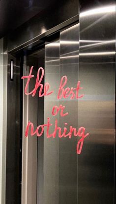 the best or nothing sign is written on an elevator door with red writing that says,'the best or nothing '