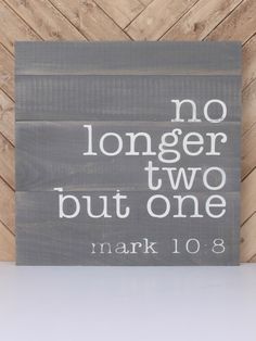 a wooden sign that says no longer two but one mark 10 8