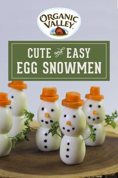 an egg snowman with carrots on it and the words, organic valley cut & easy egg snowmen