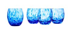 four blue wine glasses sitting next to each other