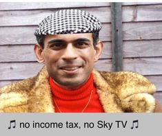 a man wearing a hat and jacket with the words no income tax, not sky tv