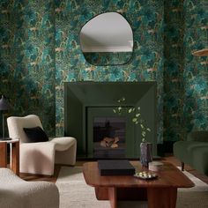 a living room filled with furniture and a fire place in front of a wall mounted mirror