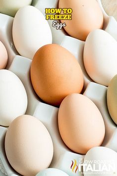 an egg tray filled with eggs on top of a table