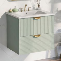 a bathroom sink sitting next to a mirror