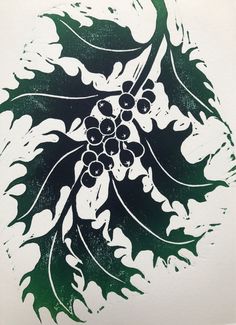 a drawing of grapes and leaves on white paper with green ink in the middle,