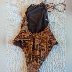 Gorgeous Earthtone Ikat Print, Plunge Back, Gathered Halter Top Neckline, Open Back One Piece Chic Swimsuit Chic Swimsuit, Top Neckline, Halter Swimsuit, Ikat Print, Swimsuits Halter, Ulla Johnson, Halter Top, Open Back, One Piece