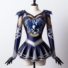 a female figure is wearing a blue and silver leotard dress with an eagle on it